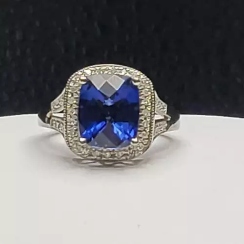 10K White Gold Ring with 4.0ct Tanzanite & 0.25ct Diamond Halo B16-9